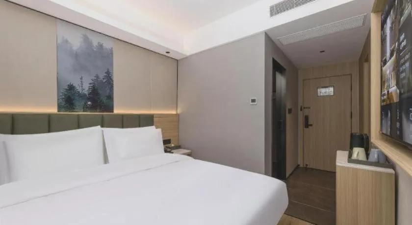 Bed in GreenTree Inn Suzhou Wuzhong