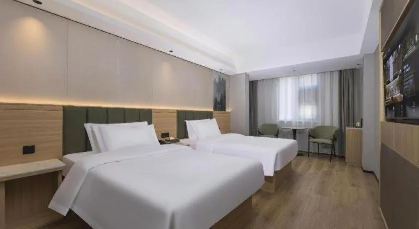 Bed in GreenTree Inn Suzhou Wuzhong