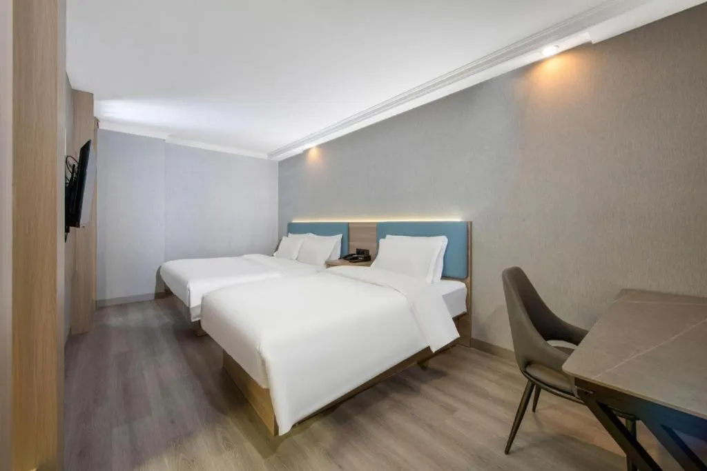 Bed in GreenTree Inn Hotel - Nantong Hongming Plaza