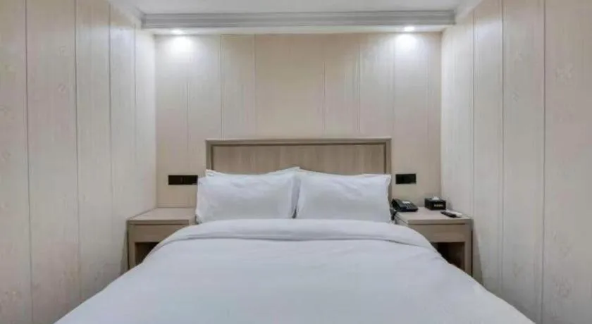Bed in GreenTree Inn Hotel - Nantong Hongming Plaza