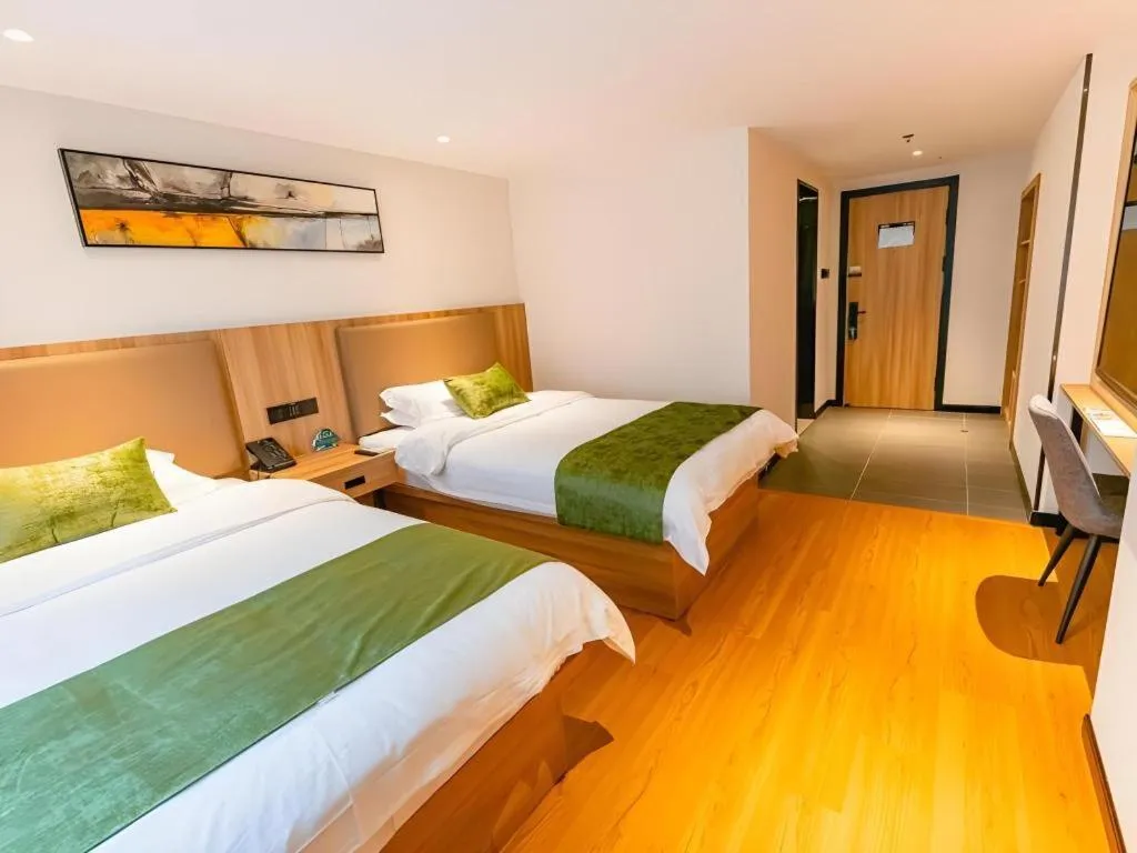 Bed in GreenTree Inn Shanghai Xupu Bridge Hotel