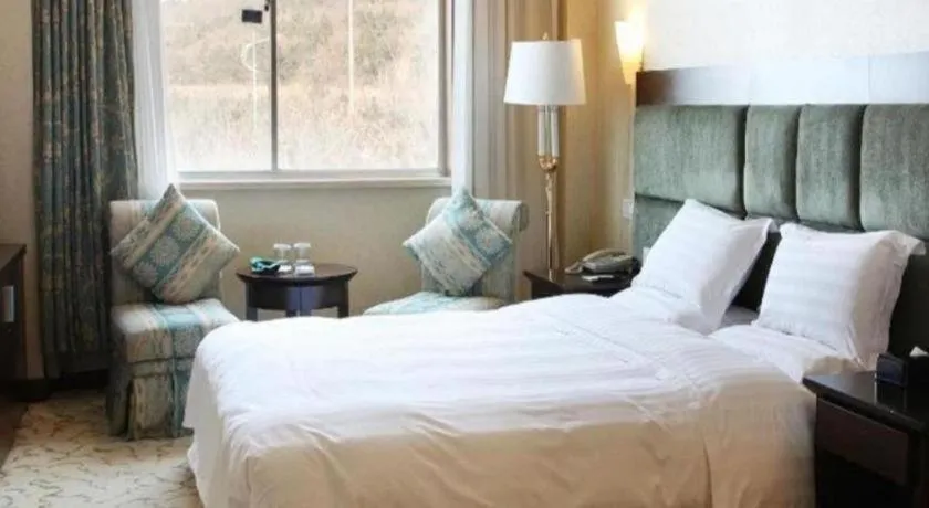 Bed in Golden Bay Hotel Weihai
