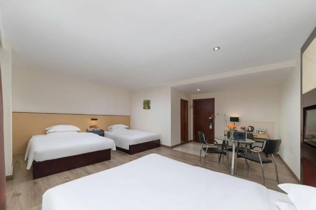 Bed in GreenTree Inn Zhongshan Nanlang Metro Station Branch