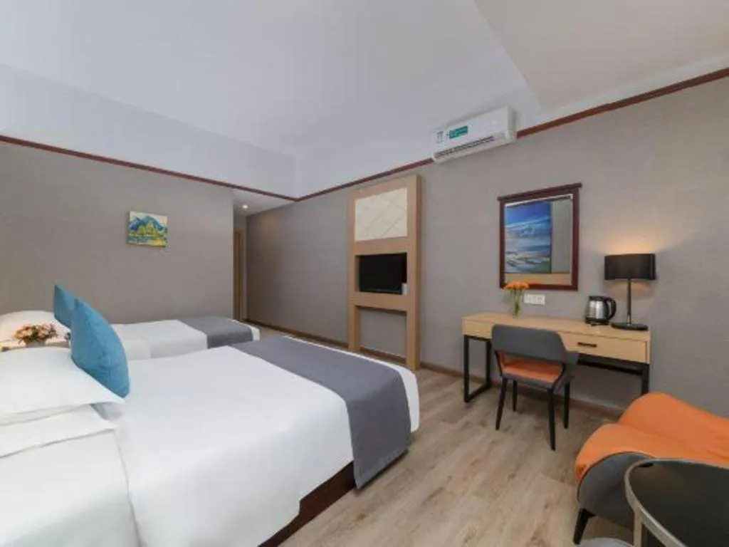 Bed in GreenTree Inn Zhongshan Nanlang Metro Station Branch