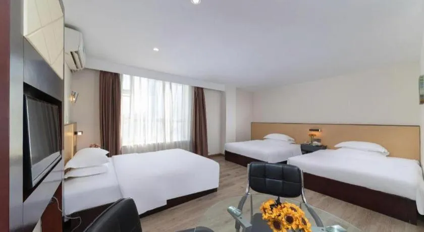 Bed in GreenTree Inn Zhongshan Nanlang Metro Station Branch