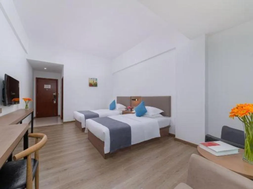 Bed in GreenTree Inn Zhongshan Nanlang Metro Station Branch