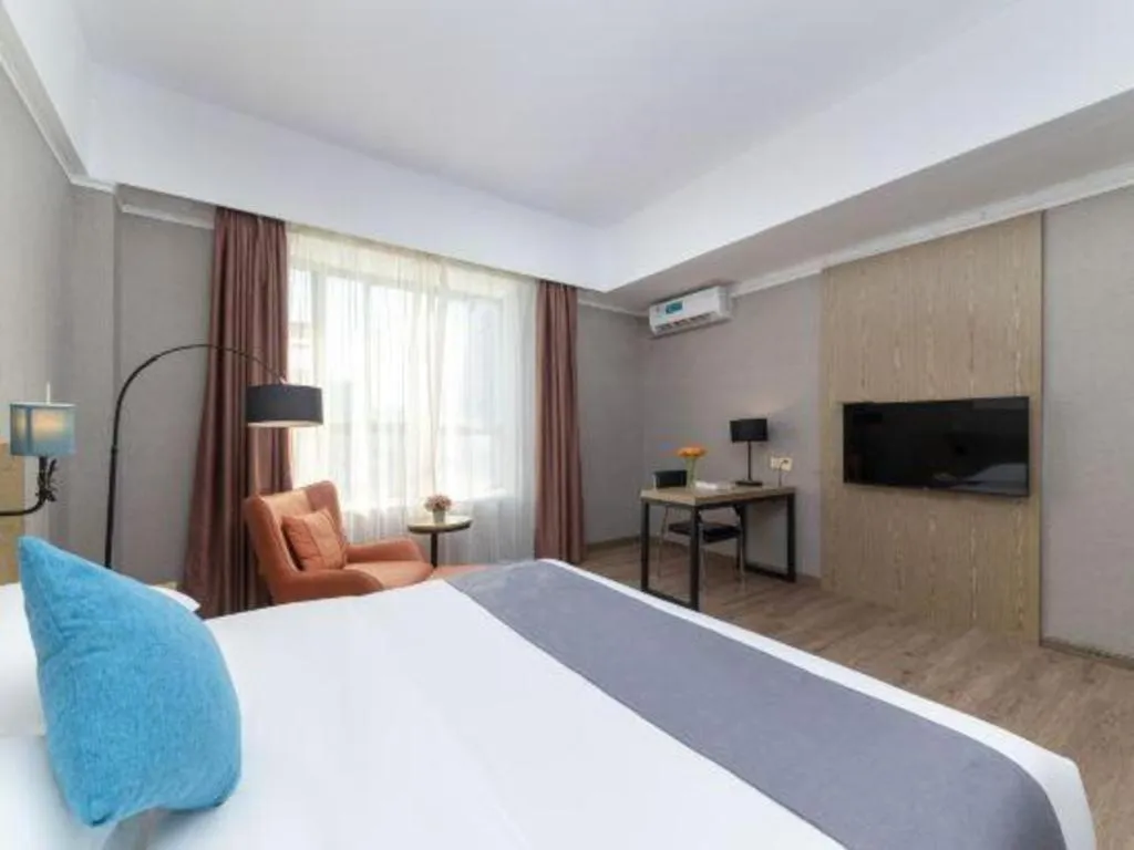 Bed in GreenTree Inn Zhongshan Nanlang Metro Station Branch