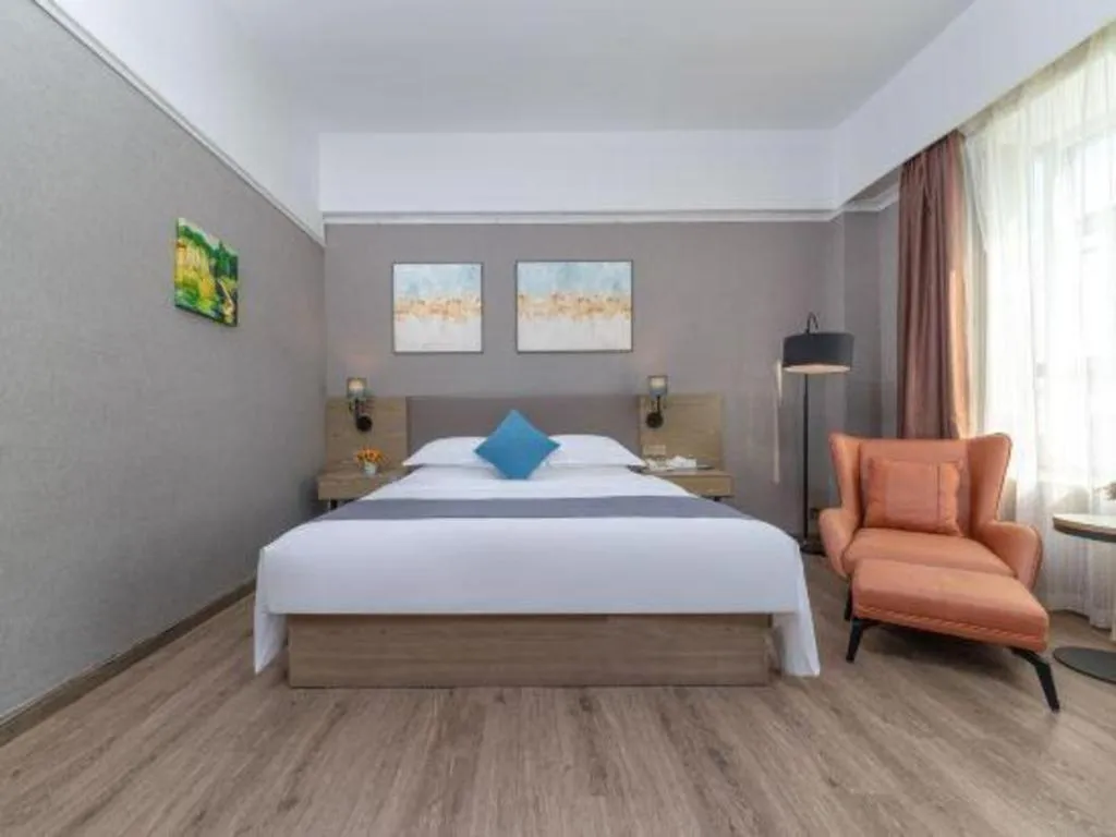 Bed in GreenTree Inn Zhongshan Nanlang Metro Station Branch