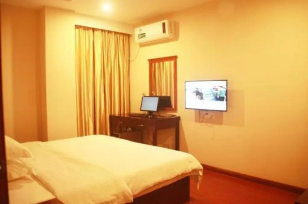Bed in GreenTree Inn Zhongshan Nanlang Metro Station Branch