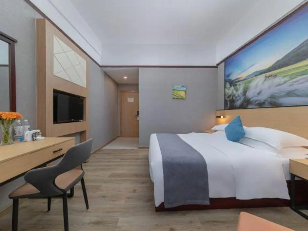 Bed in GreenTree Inn Zhongshan Nanlang Metro Station Branch