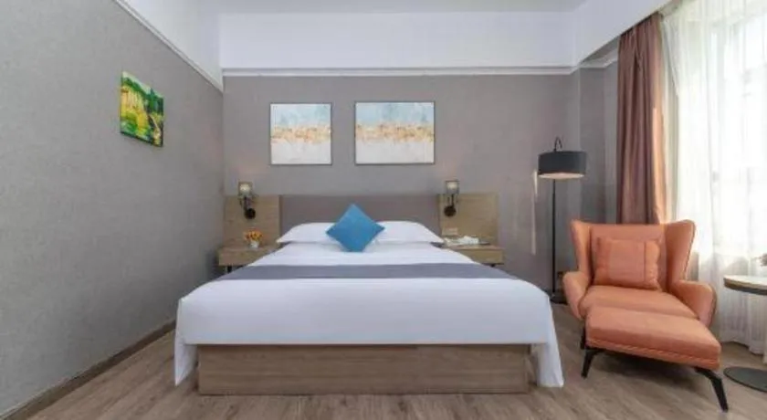 Bed in GreenTree Inn Zhongshan Nanlang Metro Station Branch