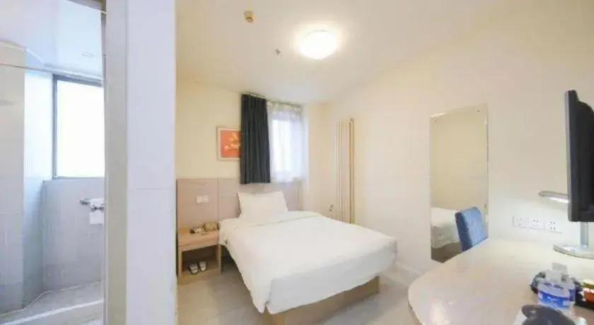 Bed in Jinjiang Inn Qingdao Wuxi Square Nanjing Road Metro Station Bed in Jinjiang Inn Qingdao Wuxi Square Nanjing Road Metro Station