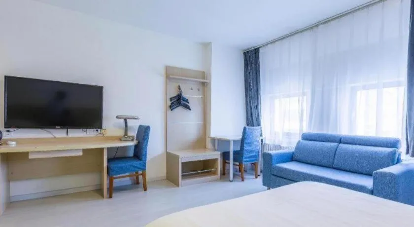 Bed in Jinjiang Inn Qingdao Wuxi Square Nanjing Road Metro Station