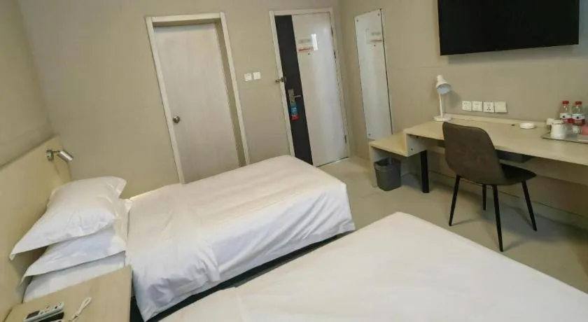 Bed in Jinjiang Inn Qingdao International Exhibition Center Haier Road