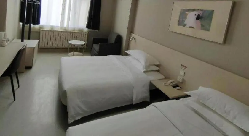 Bed in Jinjiang Inn Qingdao International Exhibition Center Haier Road