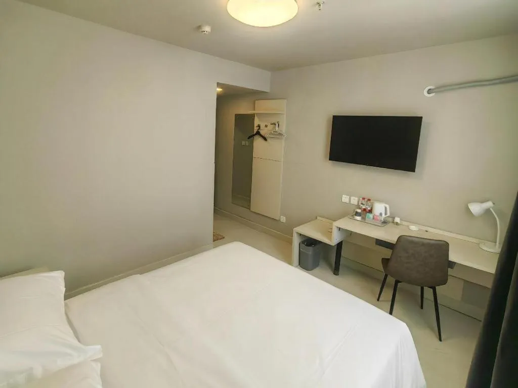 Bed in Jinjiang Inn Qingdao International Exhibition Center Haier Road