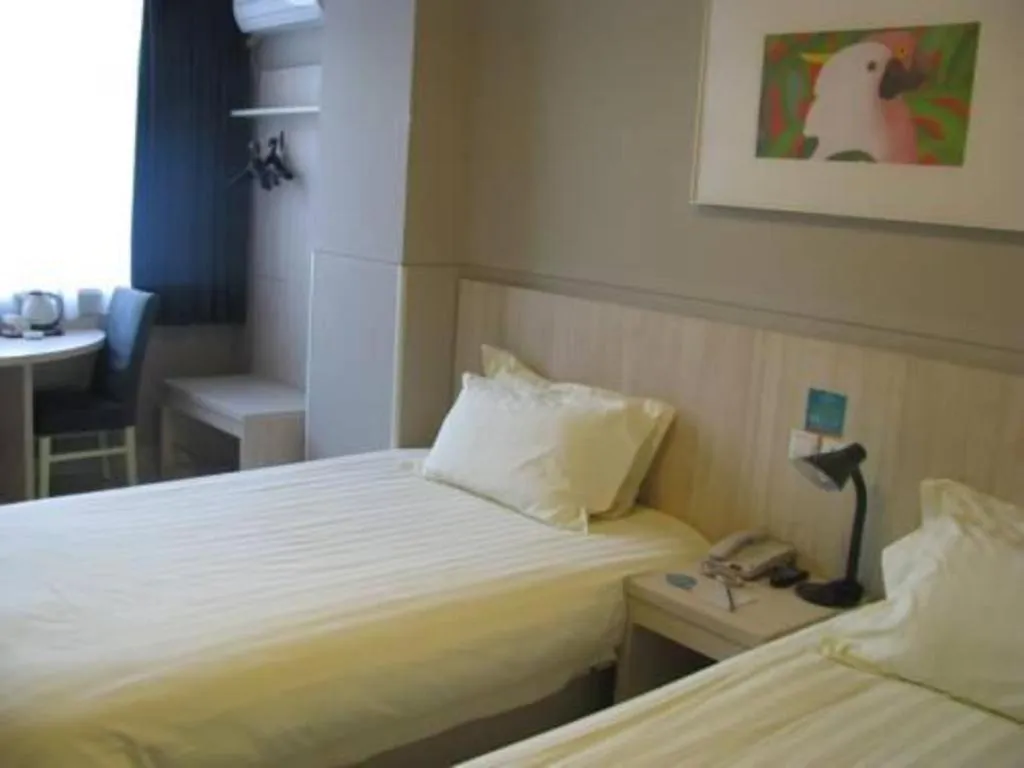 Bed in Jinjiang Inn Qingdao International Exhibition Center Haier Road