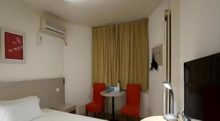 Bed in Jinjiang Inn Qingdao International Exhibition Center Haier Road