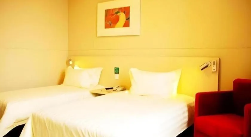 Bed in Jinjiang Inn Qingdao International Exhibition Center Haier Road