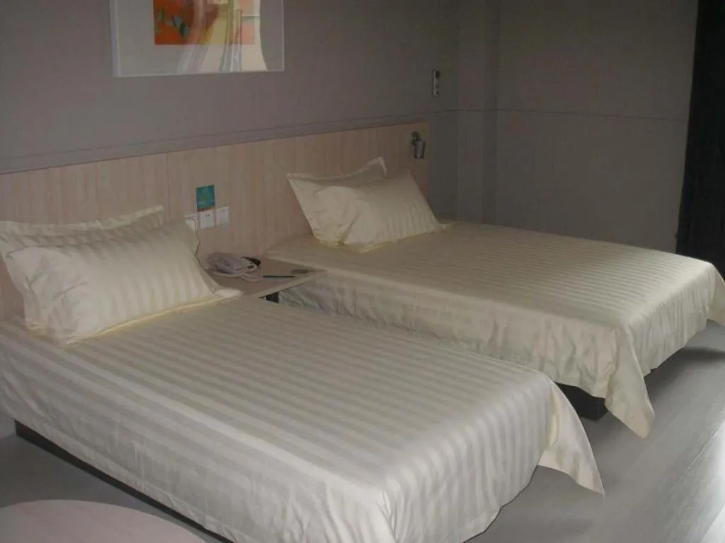 Bed in Jinjiang Inn Qingdao International Exhibition Center Haier Road