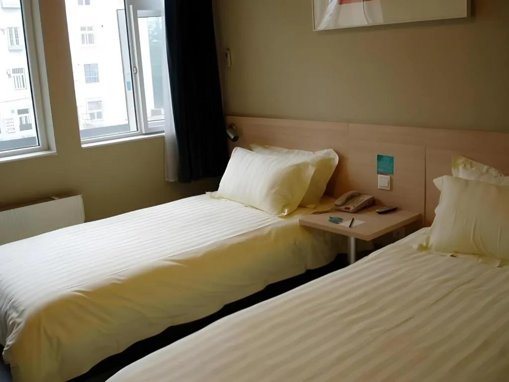 Bed in Jinjiang Inn Qingdao International Exhibition Center Haier Road