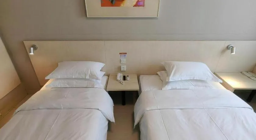 Bed in Jinjiang Inn Qingdao International Exhibition Center Haier Road