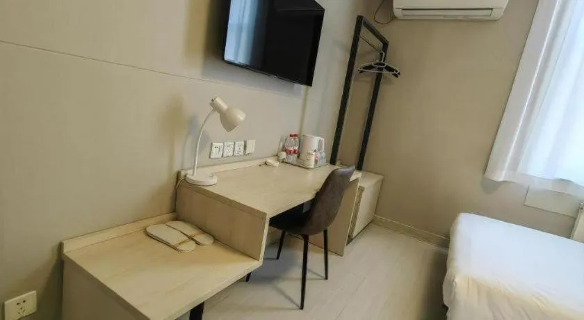 Bed in Jinjiang Inn Qingdao International Exhibition Center Haier Road