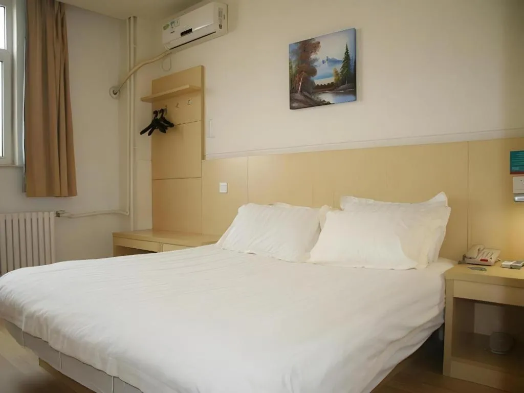 Bed in Jinjiang Inn Qingdao International Exhibition Center Haier Road