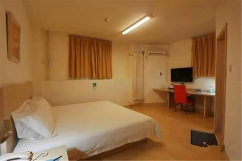 Bed in Jinjiang Inn Qingdao International Exhibition Center Haier Road