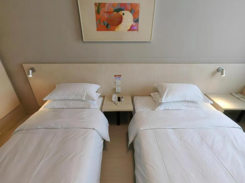 Bed in Jinjiang Inn Qingdao International Exhibition Center Haier Road