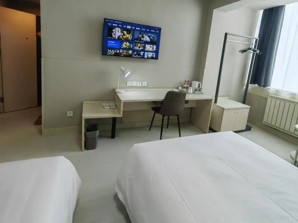 Bed in Jinjiang Inn Qingdao International Exhibition Center Haier Road