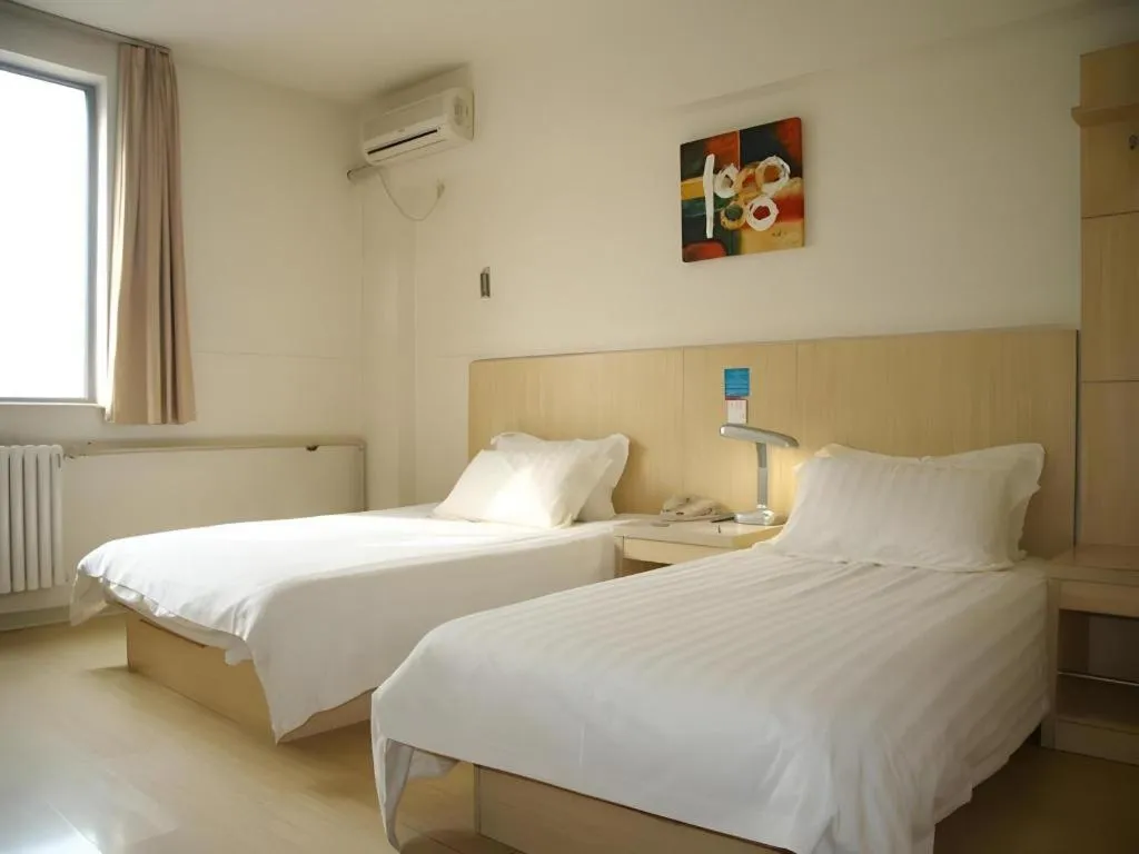 Bed in Jinjiang Inn Qingdao International Exhibition Center Haier Road