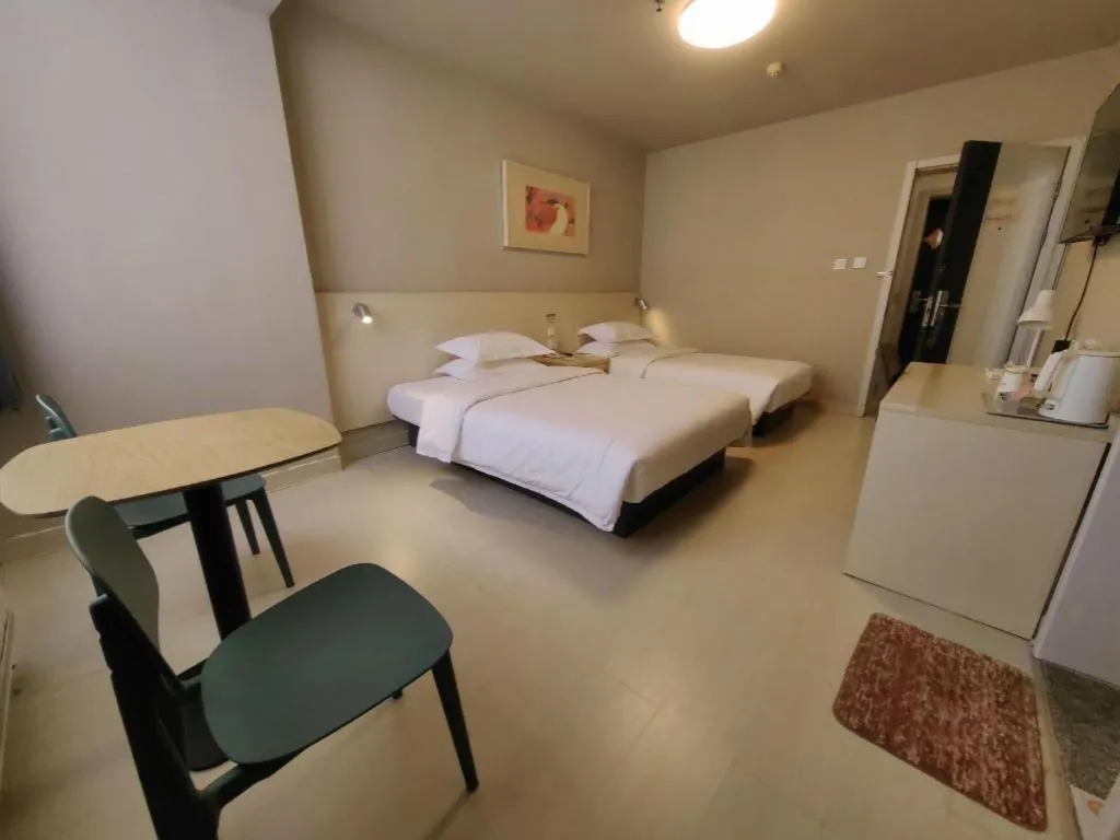 Bed in Jinjiang Inn Qingdao International Exhibition Center Haier Road