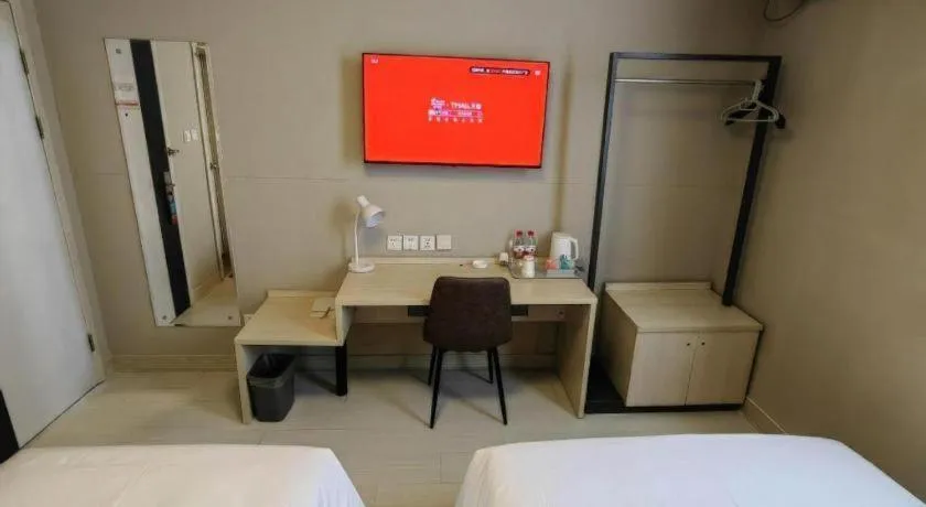 Bed in Jinjiang Inn Qingdao International Exhibition Center Haier Road
