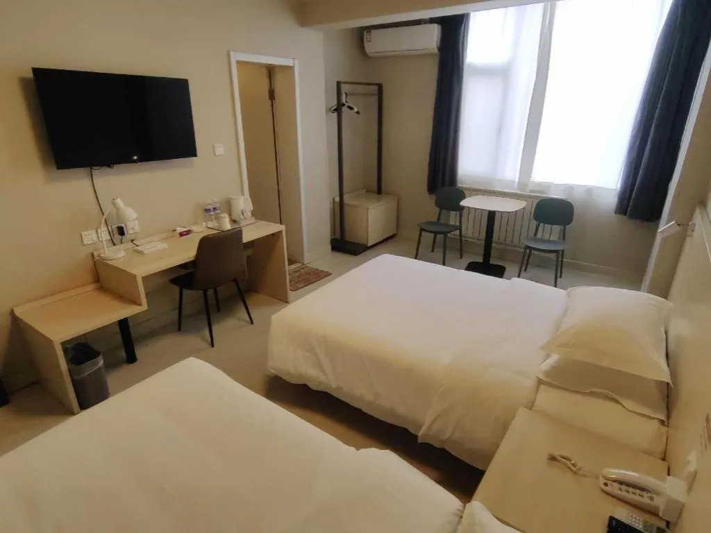 Bed in Jinjiang Inn Qingdao International Exhibition Center Haier Road