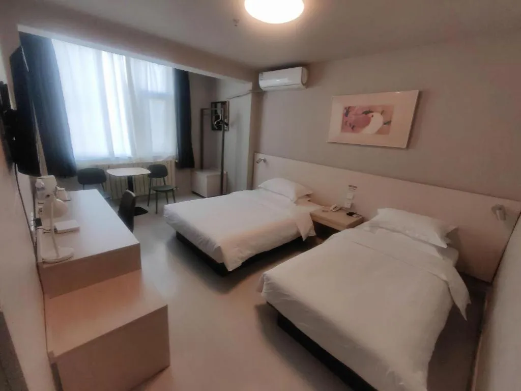 Bed in Jinjiang Inn Qingdao International Exhibition Center Haier Road