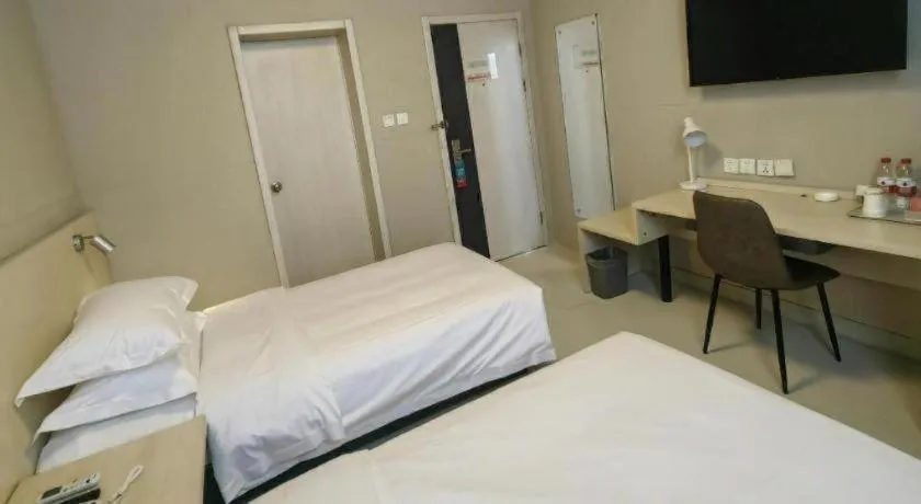 Bed in Jinjiang Inn Qingdao International Exhibition Center Haier Road