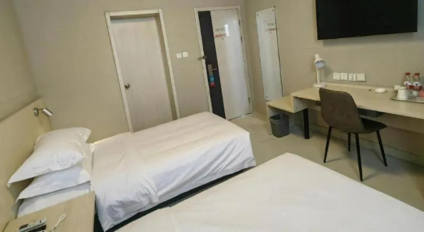 Bed in Jinjiang Inn Qingdao International Exhibition Center Haier Road