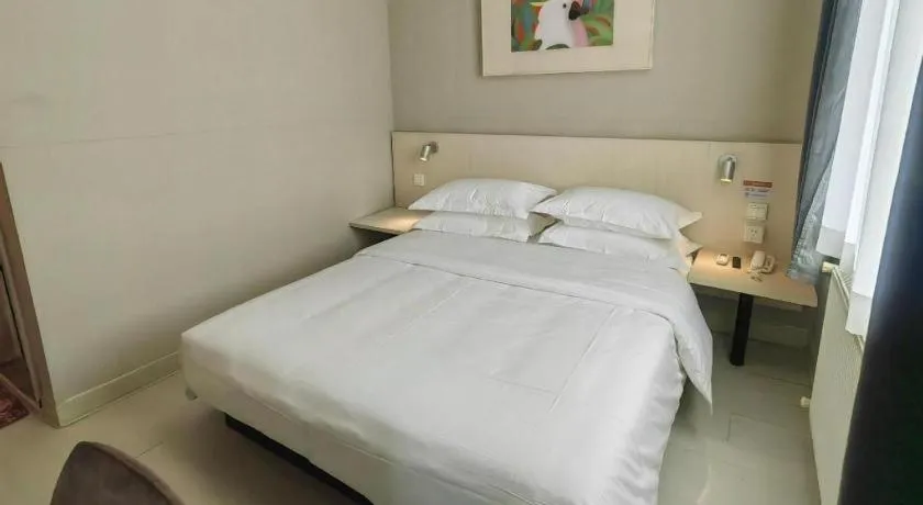 Bed in Jinjiang Inn Qingdao International Exhibition Center Haier Road