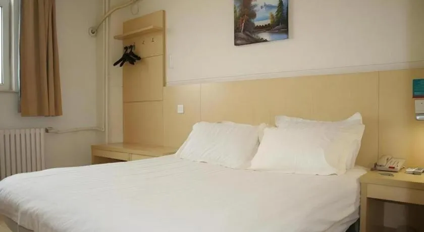 Bed in Jinjiang Inn Qingdao International Exhibition Center Haier Road