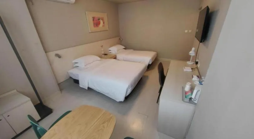 Bed in Jinjiang Inn Qingdao International Exhibition Center Haier Road