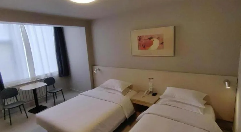 Bed in Jinjiang Inn Qingdao International Exhibition Center Haier Road