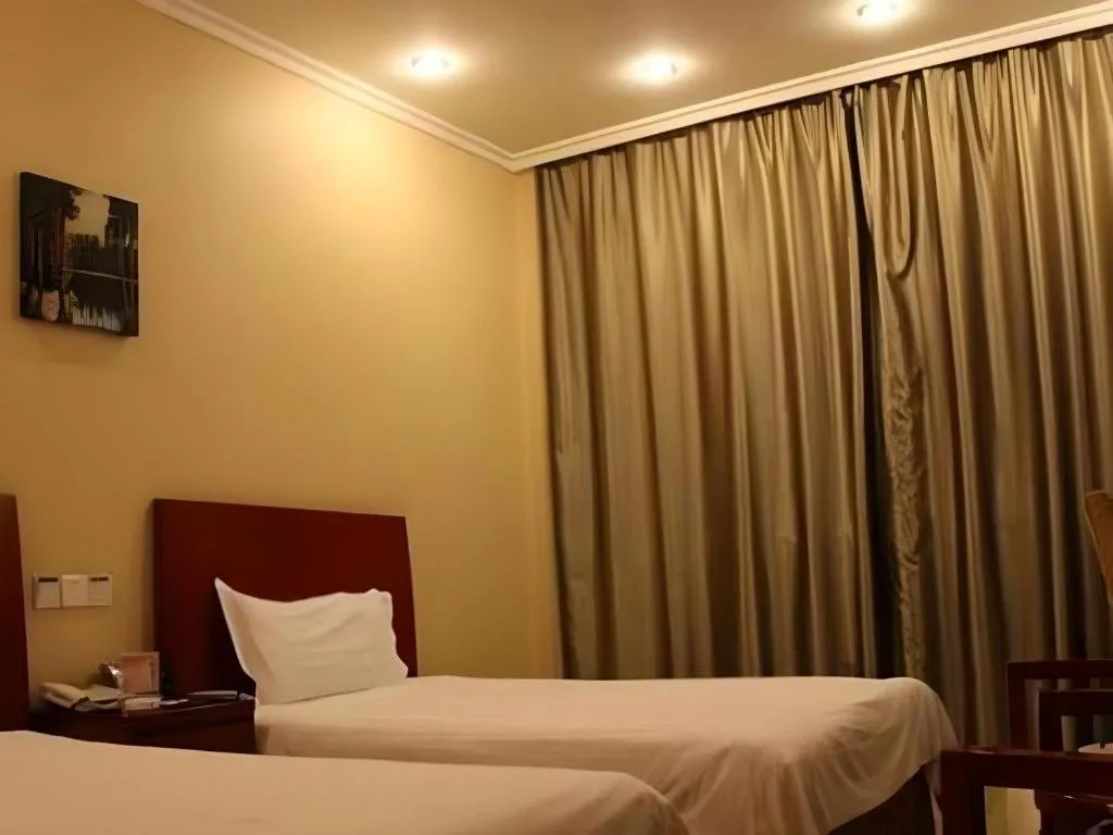 Bed in GreenTree Inn Jining Jianshe Road Hotel