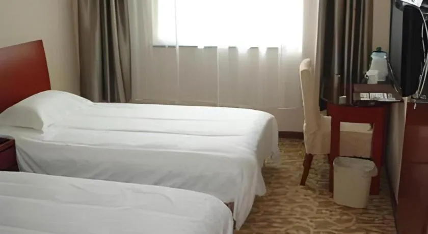 Bed in GreenTree Inn Jining Jianshe Road Hotel