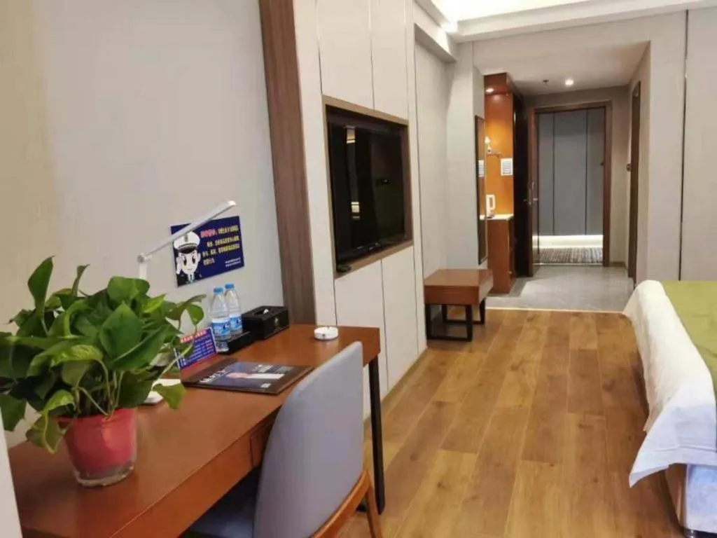 Bed in GreenTree Inn Jiuquan Century Plaza Hotel