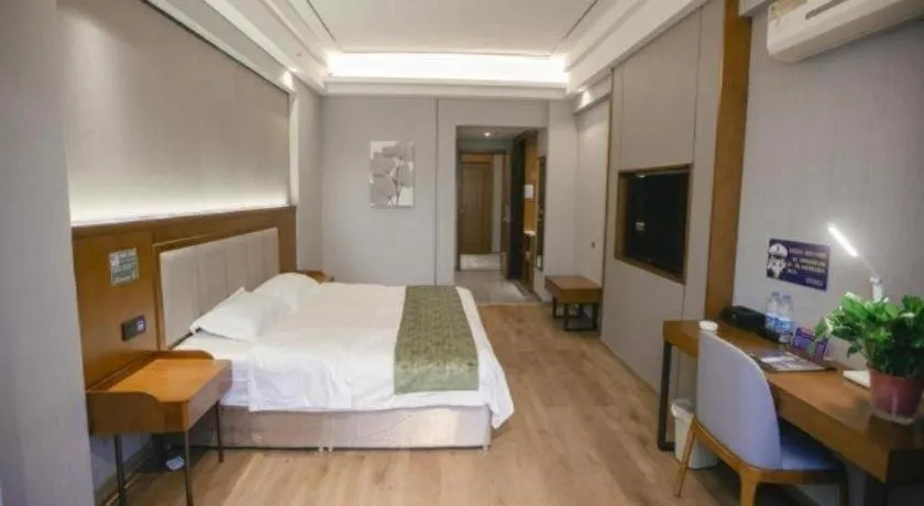 Bed in GreenTree Inn Jiuquan Century Plaza Hotel
