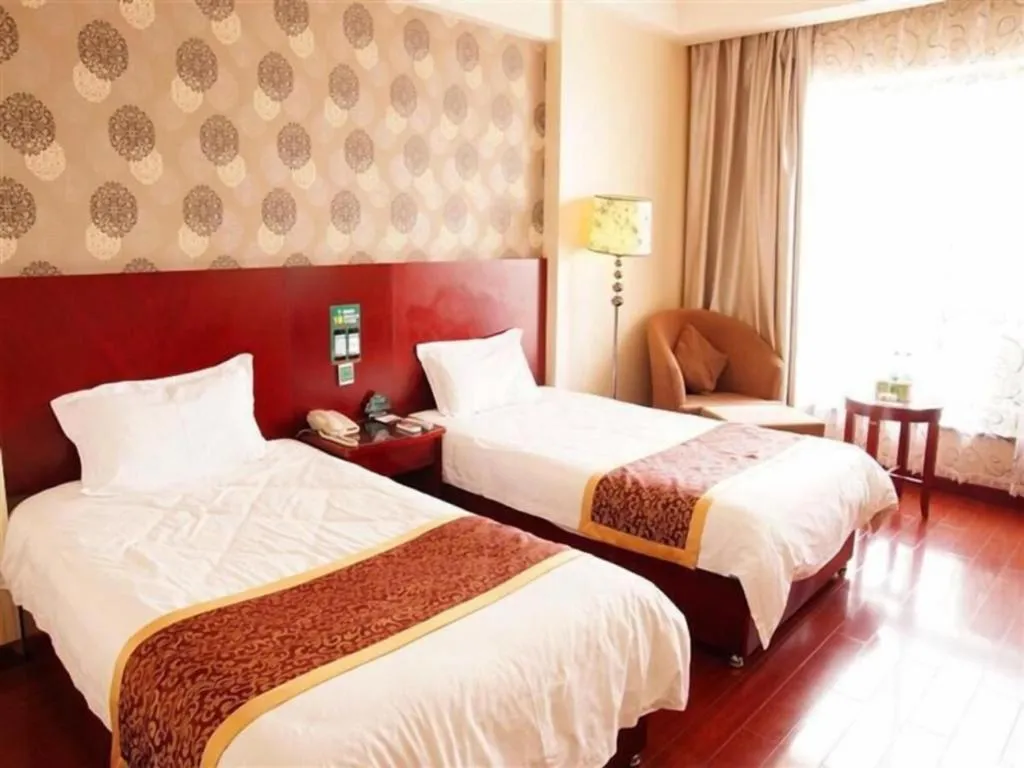 Bed in GreenTree Inn Jiuquan Century Plaza Hotel