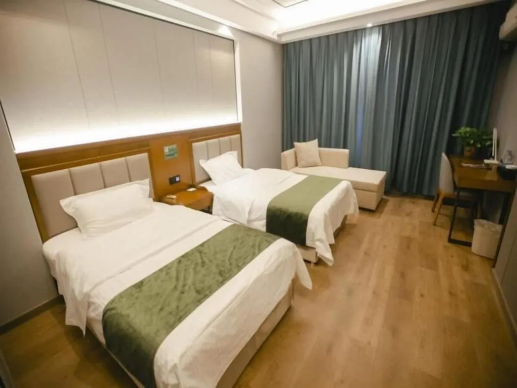 Bed in GreenTree Inn Jiuquan Century Plaza Hotel