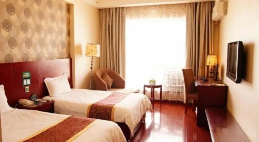 Bed in GreenTree Inn Jiuquan Century Plaza Hotel