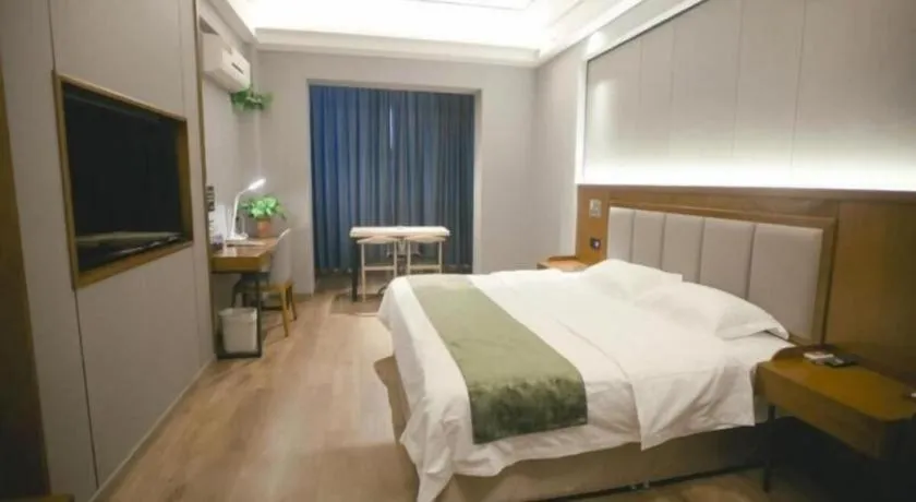 Bed in GreenTree Inn Jiuquan Century Plaza Hotel